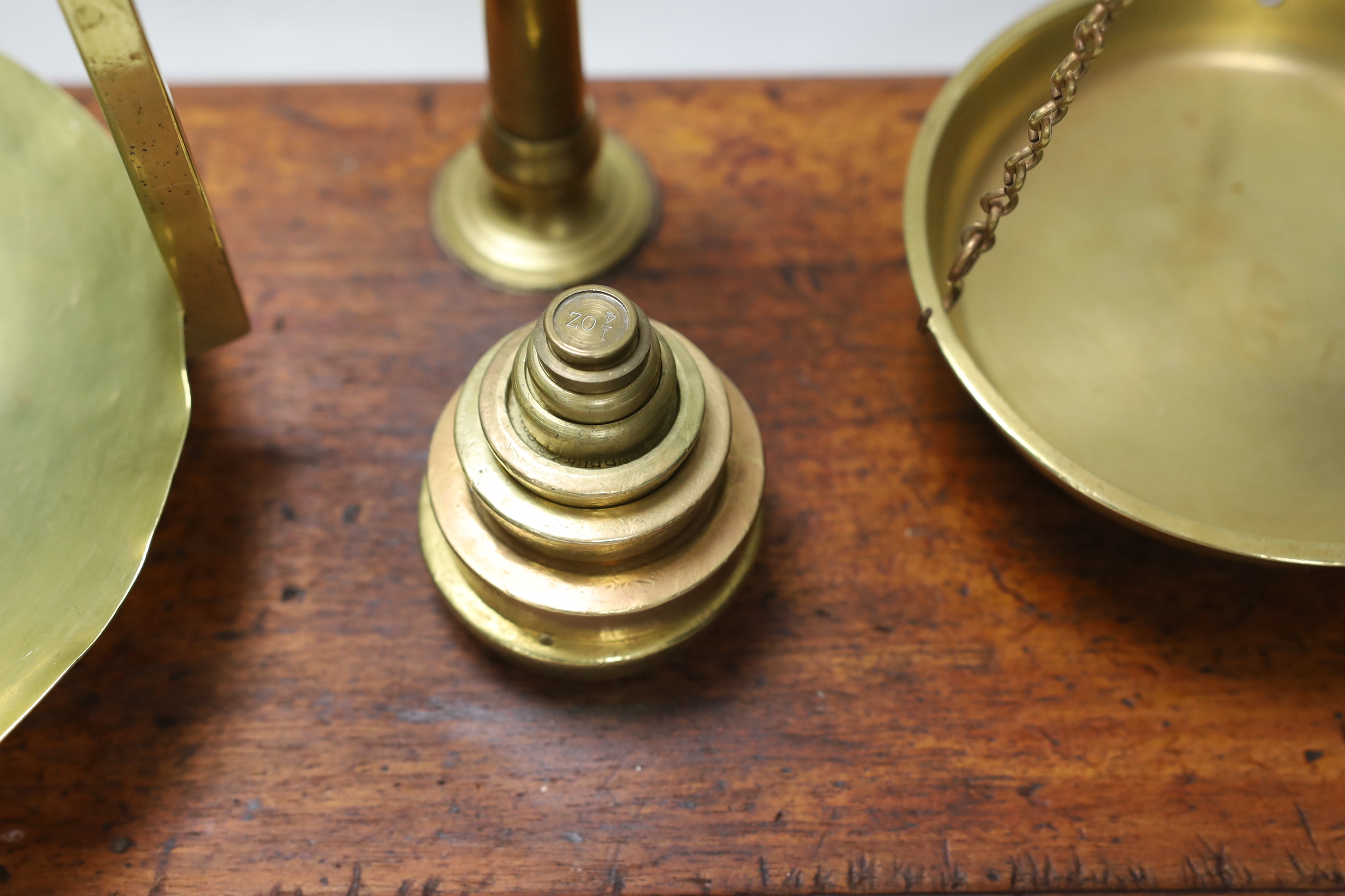 A set of Victorian brass balance scales and weights